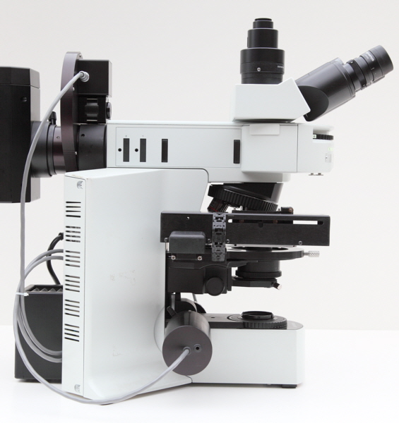 System Assembly with Stage, Focus Drive, and Filter Wheel with Integrated Controller